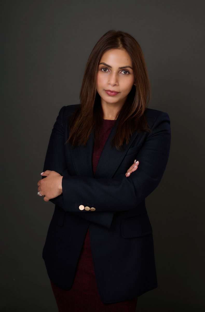 Anita Menzies, management consultant and business transformation specialist, in a navy blazer